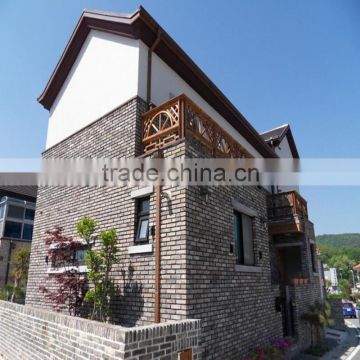 Clay Bricks and Grey Color Exterior Wall