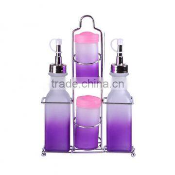 4 pieces glass cruet set with metal rack