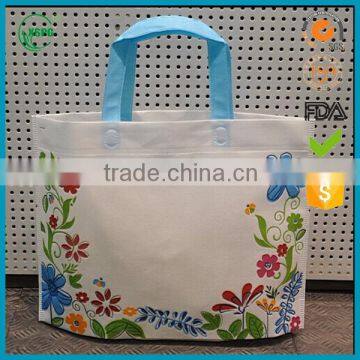 Convenient handle non-woven packing bag with colorful printing