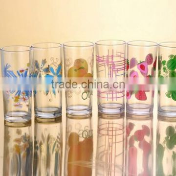 glass cup with paper decal pattern