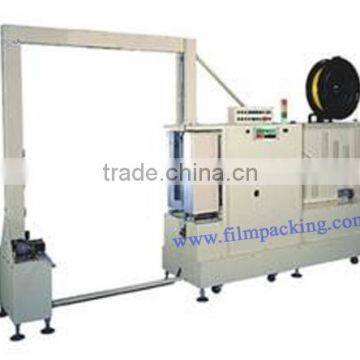 Automatic lateral side strapping machine