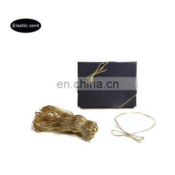 Gold metallic elastic loop for hang tag