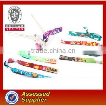 2013 festival woven wristband with metal tube & plastic uni-directly buckle