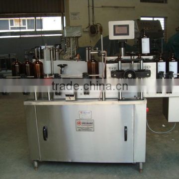 GLASS & PLASTIC BOTTLE LABELING MACHINE