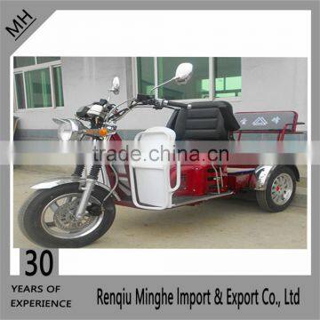 Adult motorcycle trike with open body for passenger