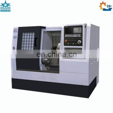 Small CNC metal lathe equipped with bar feeder for sale