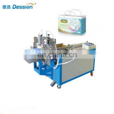 Semi automatic adult baby diaper packing machine and sealing machine