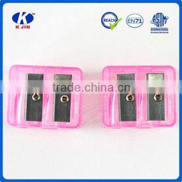 Pink plastic cosmetic pencil sharpener and clear pencil sharpener