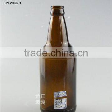 500ml dark amber open glass beer bottle with fridge magnet