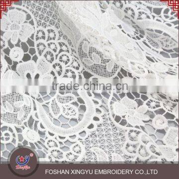 Factory welcome custom discount flower pattern embroidery on mesh netting fabric for girls dress