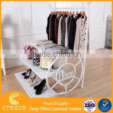 Clothing display stand for your boutique with build in shelf,metal clothes rack