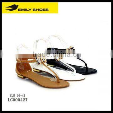 Lady' T- strap sandal with butterfly accessory