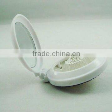 pocket hair bush with mirror
