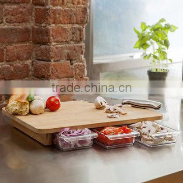 Bamboo cutting board with storage drawers