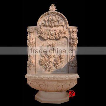 yellow marble wall garden fountain with flower carving