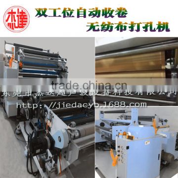 Double location for the cutting and rewinding non-woven punching machine