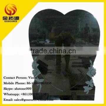 heart shaped tombstone with flower carving