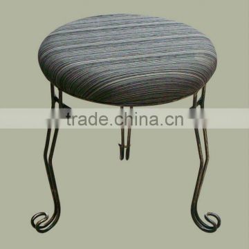 upholstered round metal leg swivel footstool with fabric cushion