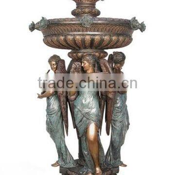 bronze water fountain with angel statues