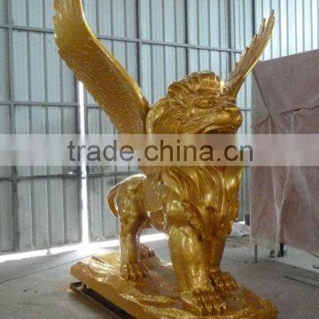 fiberglass lion statue with golden painting