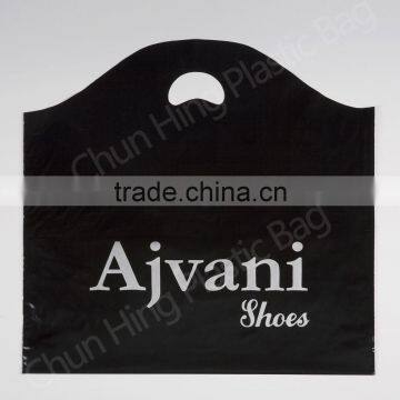 Wave top banana-cut handle plastic shopping bag