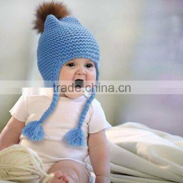 New Style Winter Warm Knitted Wool Baby Beanie Hat with Raccoon Fur Pom poms Ball/Earflaps