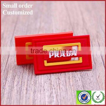 Custom red silicone pvc tags labels for shirt suitcase shoes