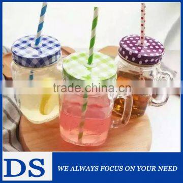 High quality glass mason jar with handle and metal lid and straw