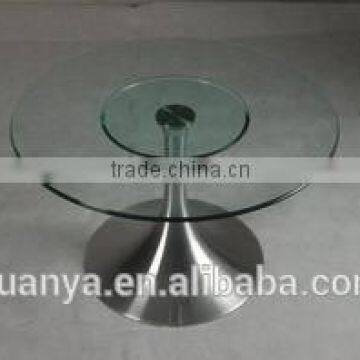 Round glass table with stainless steel base