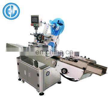 Автоматическая машина для нанесения этикеток на одежные бирки photo-2