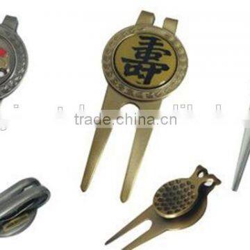 Magnet golf divot repair tool with custom logo