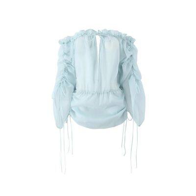 French-style seaside vacation long-sleeved blouse for women with single-strap, wooden earlobe embellishment, pleated, open at the shoulder, drawstring tie, plain color.