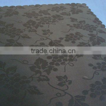 Black jacquard table cloth with the design of grapes