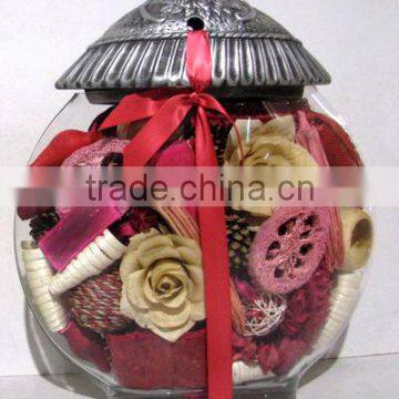 Red Potpourri And Dried Flower In Glass Vase With Ceramic Cover