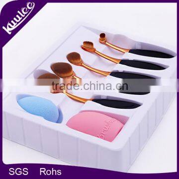 Wholesale 7pcs Rose gold tooth brush shaped Beauty Brush Set with Silicone brush cleaner and Sponge