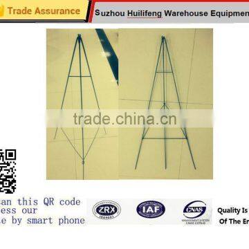 Green metal wire Folding easel for placing large holiday wreaths in the yard