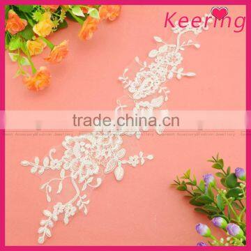 cheap embroidery lace in white for dress