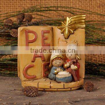 Nativity set with PEACE word on bible