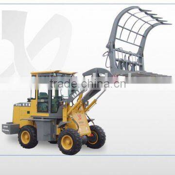 wheel loader with cane grapple wood grapple