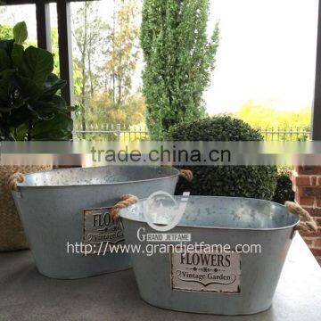 Galvanized metal pot with rope handles Galvanized Metal Bucket with Rope Handle