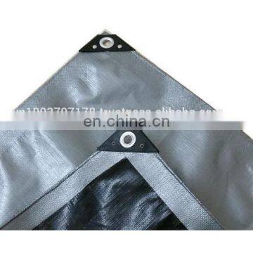 Heavy Duty Tarpaulin with plastic patch and rivet