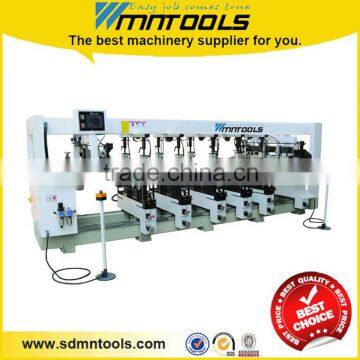 Multiple spindle boring machine for furniture production