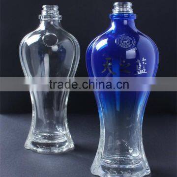 china new arrival OEM logo fancy glass liquor bottle factory