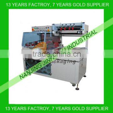 Automatic L bar shrink wrapping machine