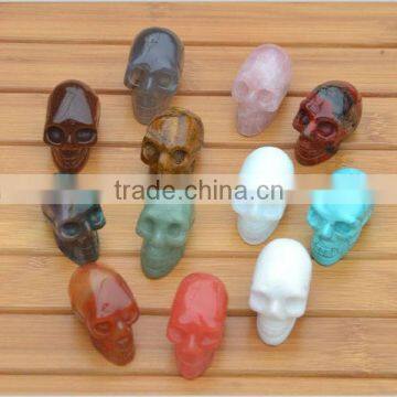 Different size semi-precious gmestone skulls carving