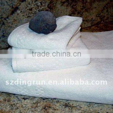Solid jacquard cotton hotel towels with satin