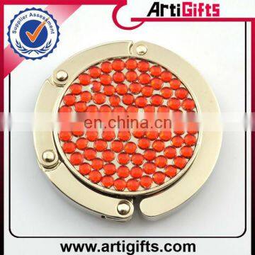 Metal hanging purse holder