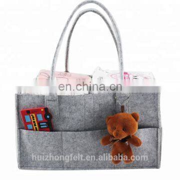 diaper caddy with shoulder belt trim leather pocket edge