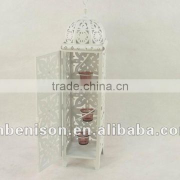 white tall metal lantern