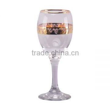 Wine glass with gold flower decal and cutting